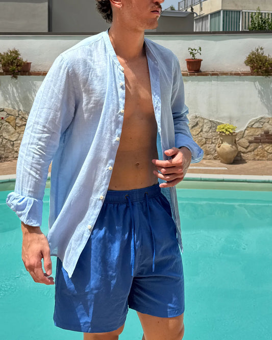 Outfit costume blu e coreana celeste indossati - Archivio Tessile