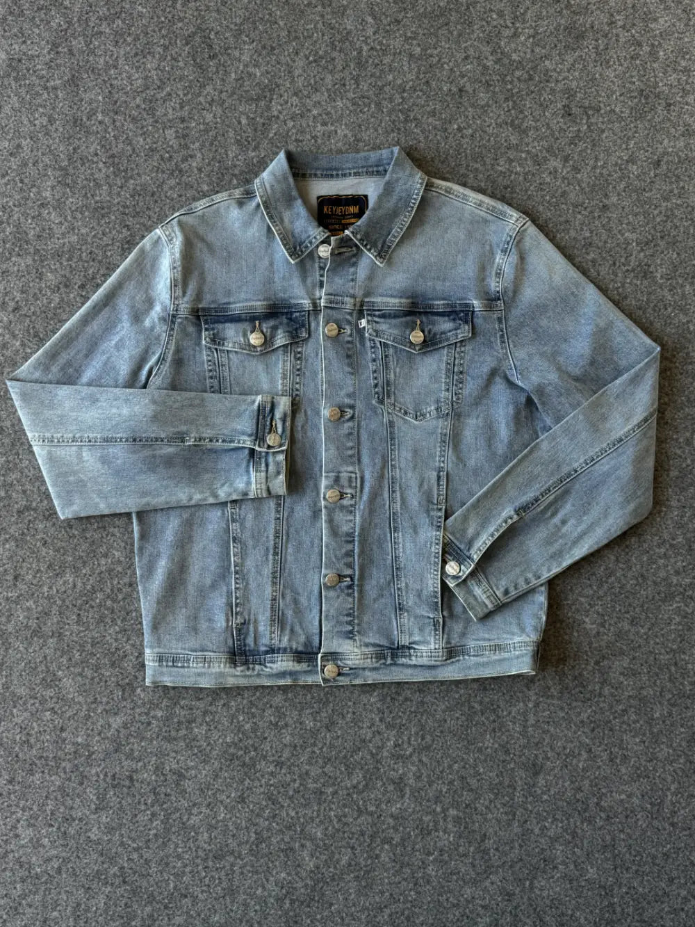 Giacca denim blu quattro tasche vestibilità regular KeyJey - Archivio Tessile