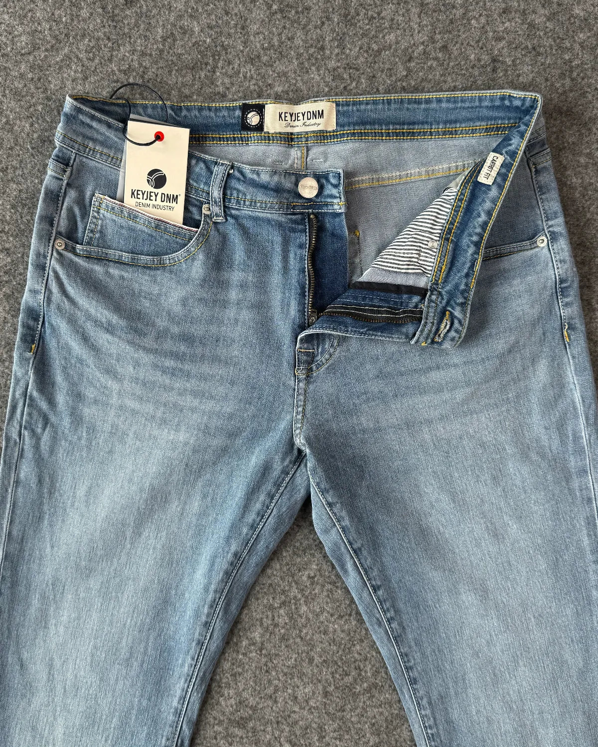 chiusura con zip YKK jeans KeyJey - Archivio Tessile